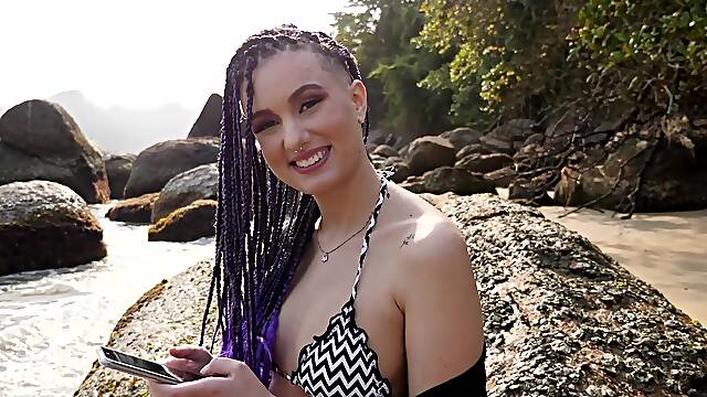 Brazilian bombshell Luara Amaral teases in a skimpy bikini on the beach