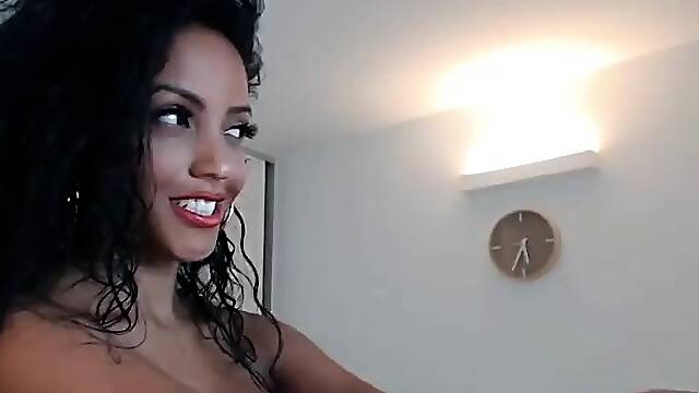 Busty curly brunette with big boobs fucks on couch