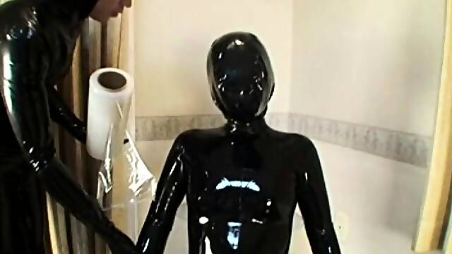Extreme fetish latex play