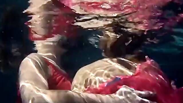Lilia Mihalkova and Natalia Kupalka underwater lesbians