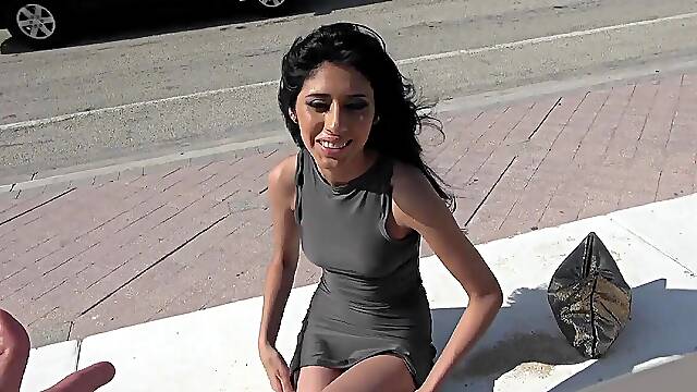 Young mexican teen Angel Del Ray giving interview outdoor