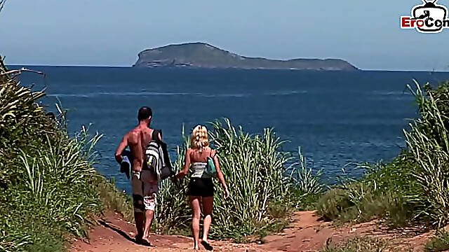 Sandwich fmm threesome at the beach with a blonde girl