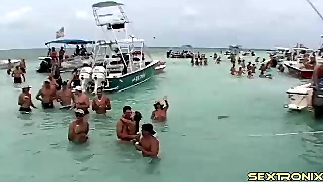 Spring break bikini babes flashing their sexy tits on the lake