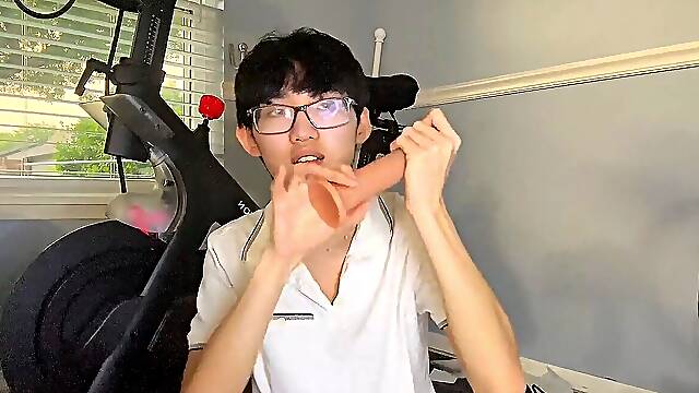 Chinese boy riding weenie