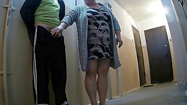 Blowjob and masturbation from mother-in-law in the entrance